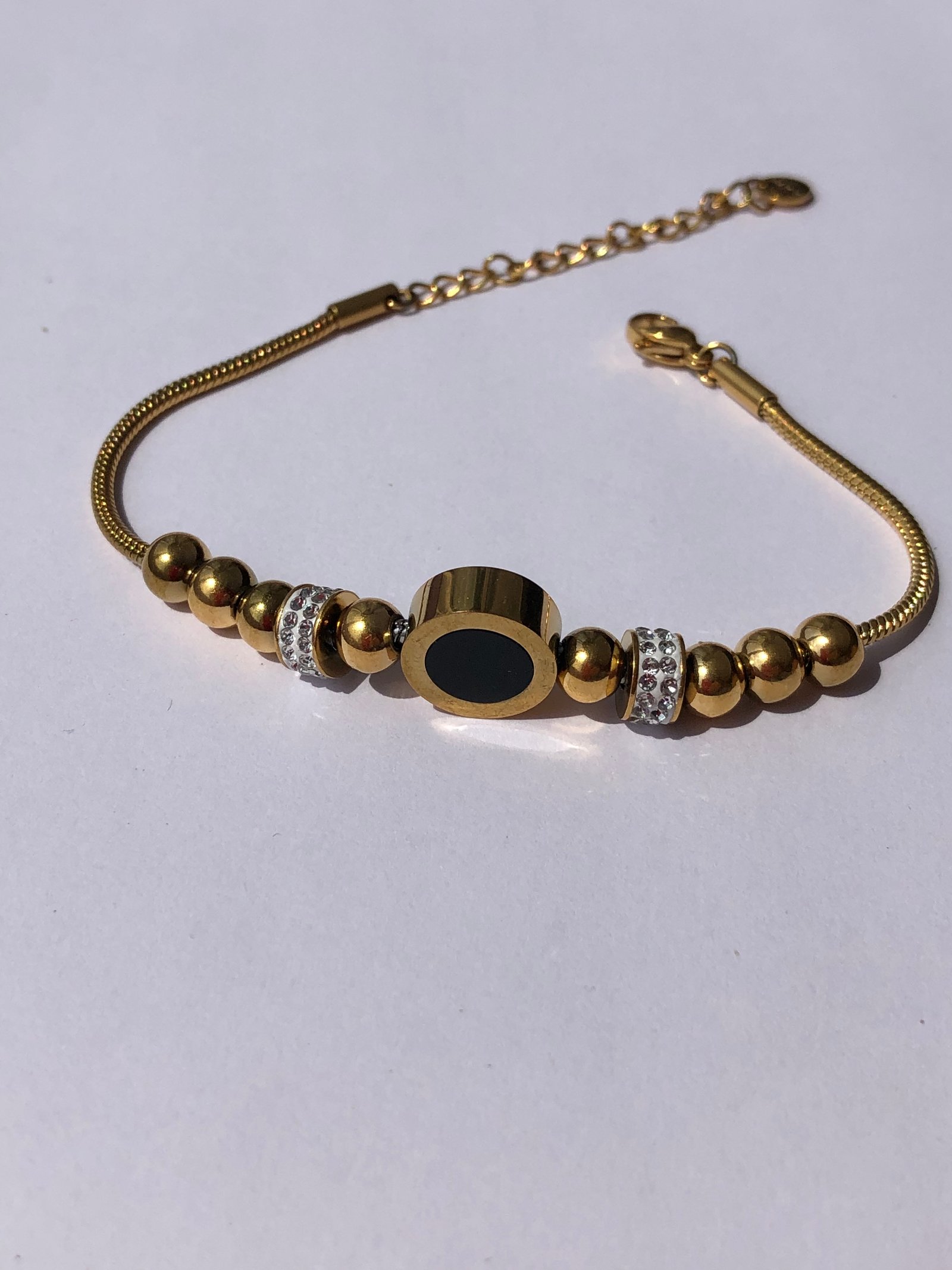 Ortası siyah Çelik gold bileklik